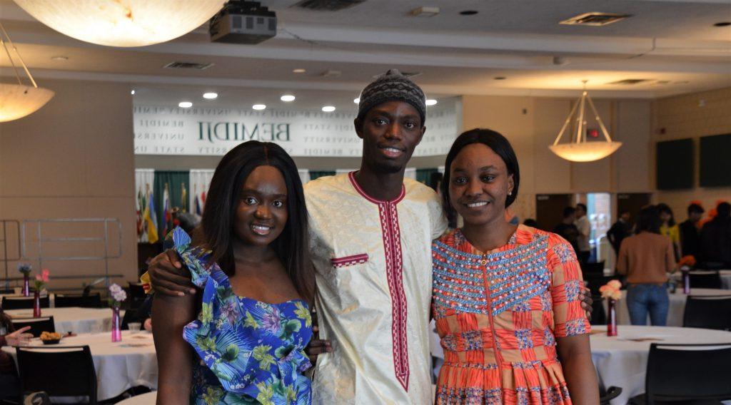 Three Students Posing in the ballroom